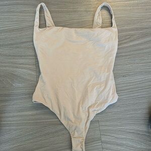 Skims nude body suit size medium